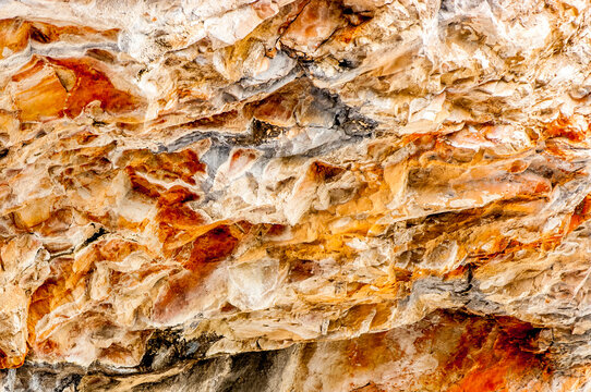 Abstract of golden colored, limestone rock; Yellowstone National Park United States of America