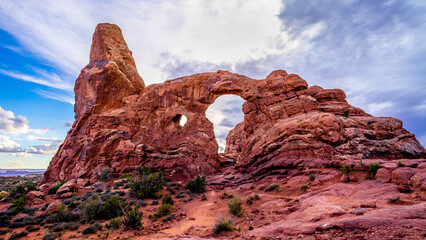 Turret Arch Window is one of the many Red Sandstone Rock Formations of Arches National Park in Utah, USA © hpbfotos