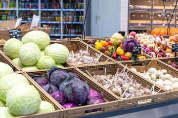 Fresh vegetables on the market counter. Vegetable farmer market counter: colorful various fresh organic healthy vegetables at grocery store. Healthy natural food concept