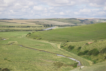 Cuckmere Haven, an area of flood plains in Sussex, England where the river Cuckmere meets the English Channel between Eastbourne and Seaford