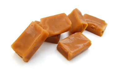 Caramel candies isolated on white background