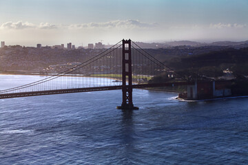 Fototapeta na wymiar Silhouette Golden Gate Bridge South Tower With Clouds