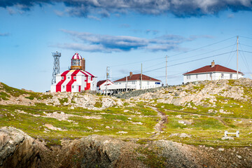 Red and white striped lighthouse popular landmark and historic building in Bonavista Newfoundland Canada.
