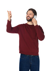 Man talking on smartphone against white background