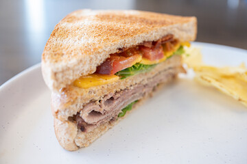 Toasted Texas Club Sandwitch ready to eat with crisps