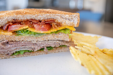 Toasted Texas Club Sandwitch ready to eat with crisps