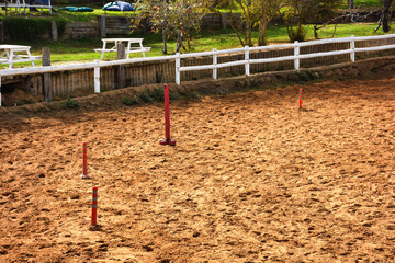 Horse riding training materials on training track at horse farm