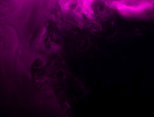 Abstract background of chaotically mixing puffs of purple smoke on a dark background