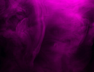 Abstract background of chaotically mixing puffs of purple smoke on a dark background