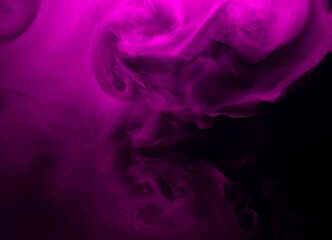 Abstract background of chaotically mixing puffs of purple smoke on a dark background