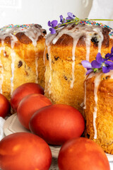 Easter red eggs and kulich bread. Christian holyday preparation. Selective focus