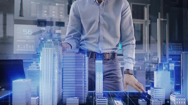 Professional Architect works with Holographic Augmented Reality 3D City Model using gestures. Technologically Advanced Office use Augmented Virtual Modeling Software Application on Futuristic Display.
