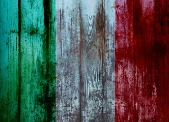 Italian flag on old wood plank