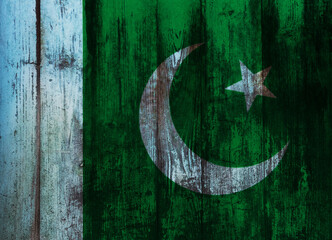 Pakistan flag on old wood plank