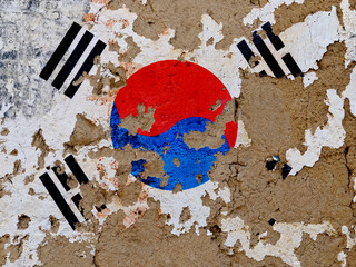 South Korean flag on mud wall