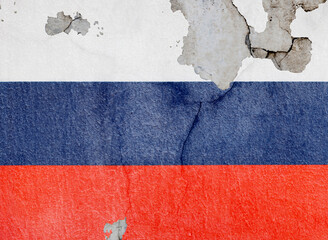 Russian flag on old wall with peeling paint