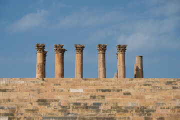 Fototapeta na wymiar Columns of the Roman Temple of Artemis and Stairs in Gerasa or Jeraash, Jordan