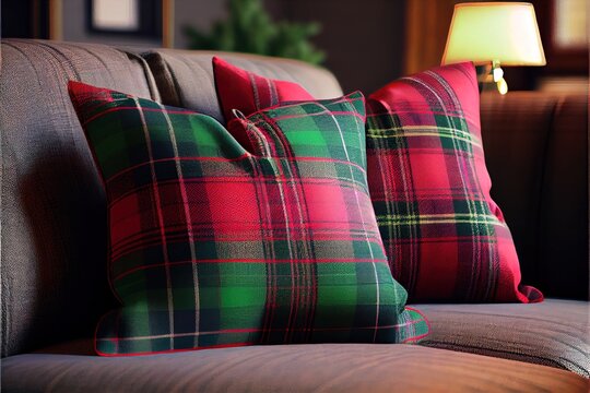  A Plaid Pillow On A Couch With A Lamp On The Side Of It And A Plaid Pillow On The Back Of The Couch.