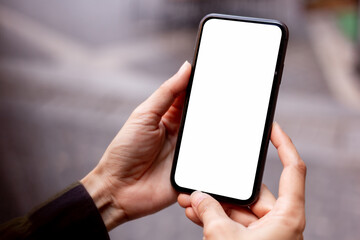 cell phone blank white screen mockup.hand holding texting using mobile on desk at office.background empty space for advertise.work people contact marketing business,technology