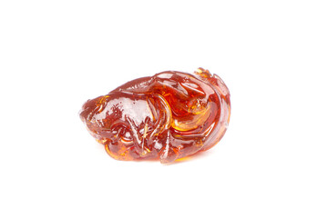 piece fragrant amber terp sauce for smoking cannabis, isolated wax weed with thc content