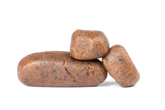 piece hash closeup isolated on white background, cannabis charas hashish