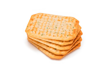 Stack of Crispy Salted Crackers with Greens - Isolated on White. Easy Snack - Isolation