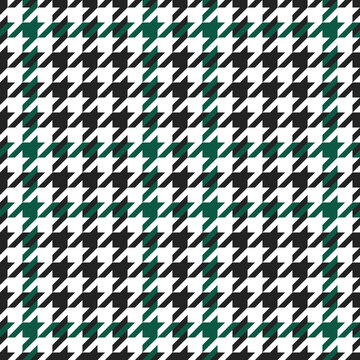 Goose foot. Pattern of crow's feet in black, green, white cage. Glen plaid. Houndstooth tartan tweed. Dogs tooth. Scottish checkered background. Seamless fabric texture. Vector illustration