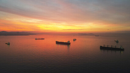 Fototapeta na wymiar aerial view of cargo ships before sunrise in sea of marmara