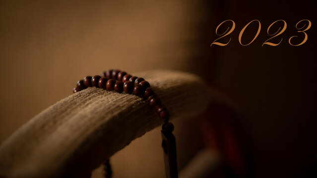 Brown 2023 new year greetings on blur background