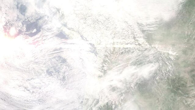 Earth zoom in from outer space to city. Zooming on Everett, Washington, USA. The animation continues by zoom out through clouds and atmosphere into space. Images from NASA