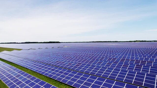 Aerial Drone Shot Of A Farm Of Solar Array Using PV Panels