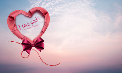 Pink, red heart made of torn paper, I love you and happy valentines day message inside, red ribbon and bead chain, on cloudy sunset background, empty space for message