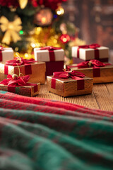 Christmas time. Christmas presents on rustic wooden table. Shallow depth of focus. Colorful bokeh lights.