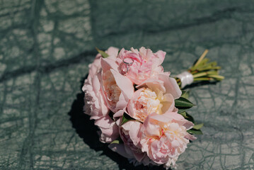 Wedding bouquet with wedding rings