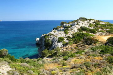 Fototapeta na wymiar Cliffs on the island of Rhodes, part of Kolimbia, Greece.