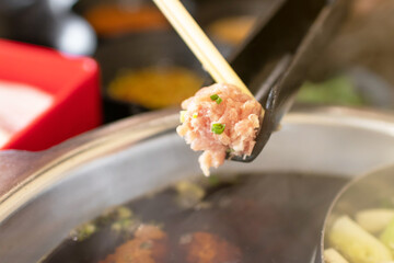 Marinated minced pork seasoned well and mixed with some herbs for shabu shabu, sukiyaki or hot pot. 