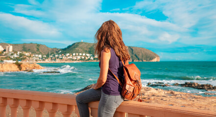 Woman tourist looking at mediterranean sea,  Spain,  Moraira