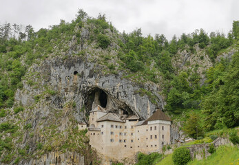 Fototapeta premium Predjama Castle the largest cave castle in the world, built inside a cave entrance in southwestern Slovenia