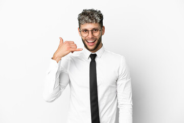 Business caucasian man isolated on white background making phone gesture. Call me back sign