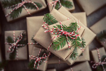Christmas Gifts gifts wrapped in brown paper . Christmas Gift wrapping concept.