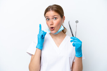 Dentist caucasian woman holding tools isolated on white background intending to realizes the solution while lifting a finger up