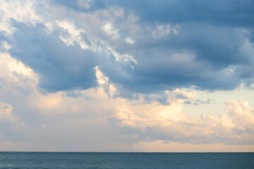 Naklejka na ściany i meble cloudy sky summer on the sea,background, fluffy clouds background