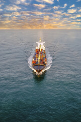 Magnificent aerial view of container transport by boat - 554435396