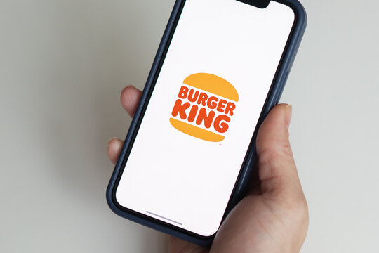 Burger King Mobile Application, Burger King Food Delivery From Restaurants, Burger King Logo On The Phone Screen