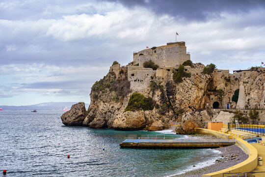 Castle And Defence Fortification On The Coast Of Gibraltar By The Sea In The Bay Of Cadiz.