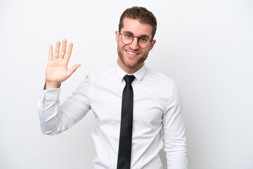 Young business caucasian man isolated on white background saluting with hand with happy expression