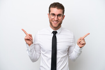 Young business caucasian man isolated on white background pointing finger to the laterals and happy