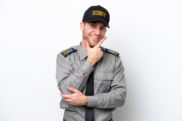 Young safeguard caucasian man isolated on white background smiling