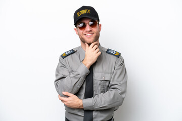 Young safeguard caucasian man isolated on white background with glasses and smiling