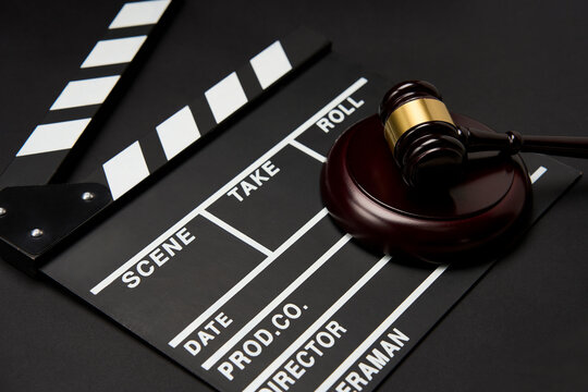Clapper board and judge gavel background